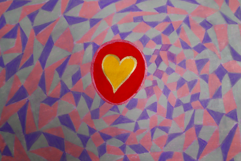 Small heart in circle against geometric pink and purple textured background.